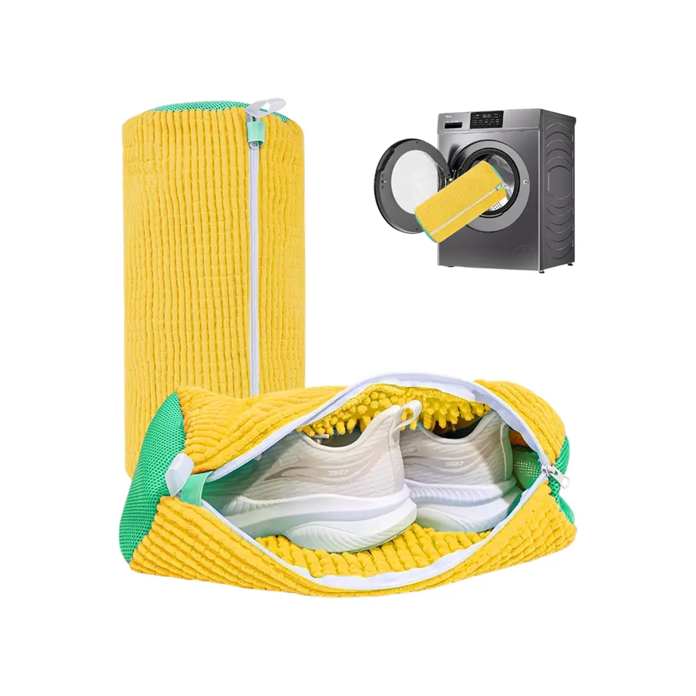 Front-load washing machine drum and controls, kept safe when shoes are washed inside a padded SoleFresh bag